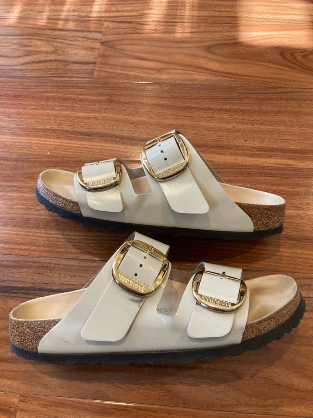 Birkenstock White Double Buckle Slide Sandals with Gold Buckles